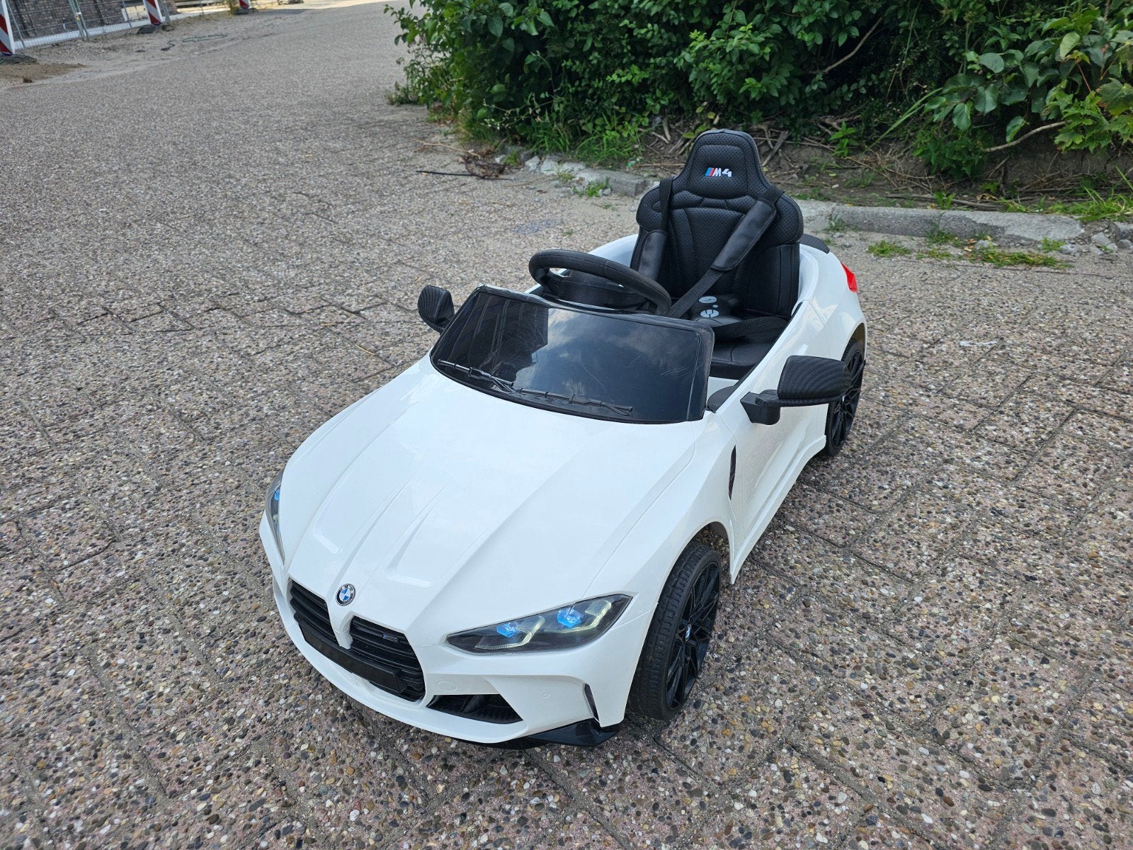 BMW M4 elektrische kinderauto met afstandsbediening, Ophalen, Zo goed als nieuw