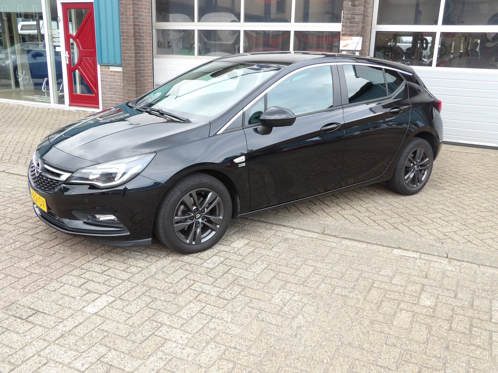 Opel Astra 1.0 Turbo 120 Jaar Edition (bj 2019), Auto's, Gebruikt, Euro 6, Verwarmde buitenspiegels, 610 kg
