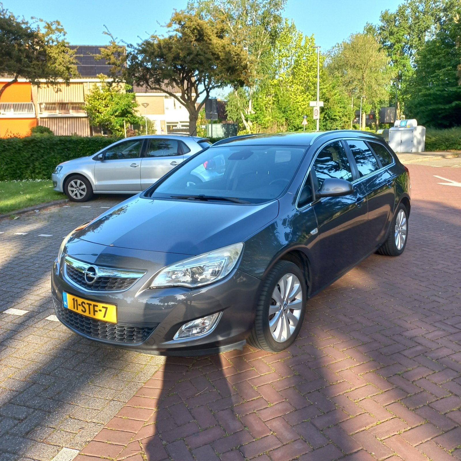 Opel Astra 1.4 Turbo Sports Tourer 2011 apk 7 juli 2027, Auto's, Opel, Euro 5, 15 km/l, Zwart, 4 cilinders