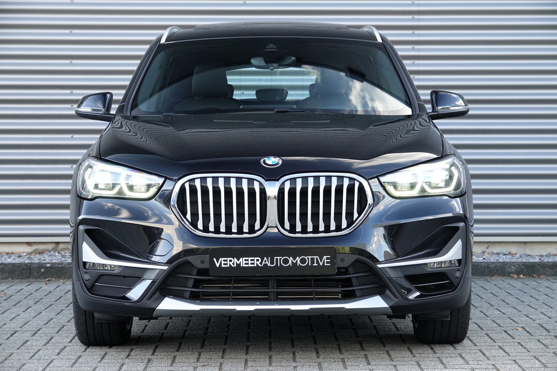 BMW X1 sDrive20i Orange Edition | Panoramadak | Head-up | Ca, Auto's, 4 cilinders, 179 pk, Zwart, Bedrijf