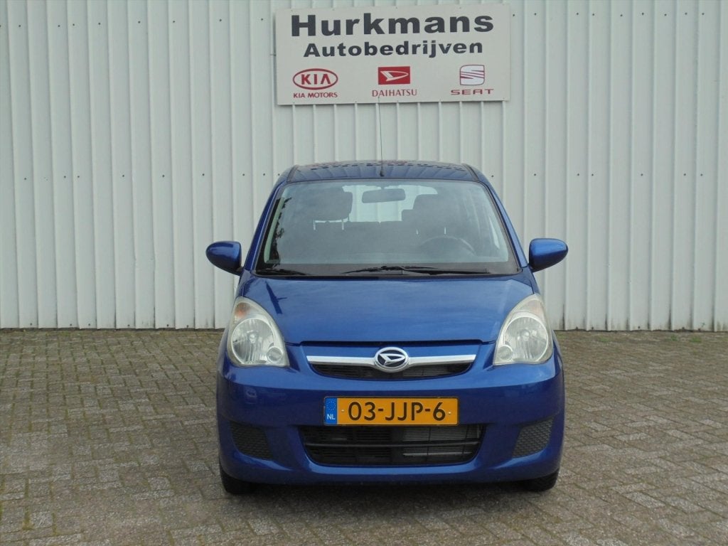 Daihatsu Cuore 1.0 69Pk 5drs Premium Automaat (bj 2009), Auto's, Automaat, 12 maanden, Stof, Zwart
