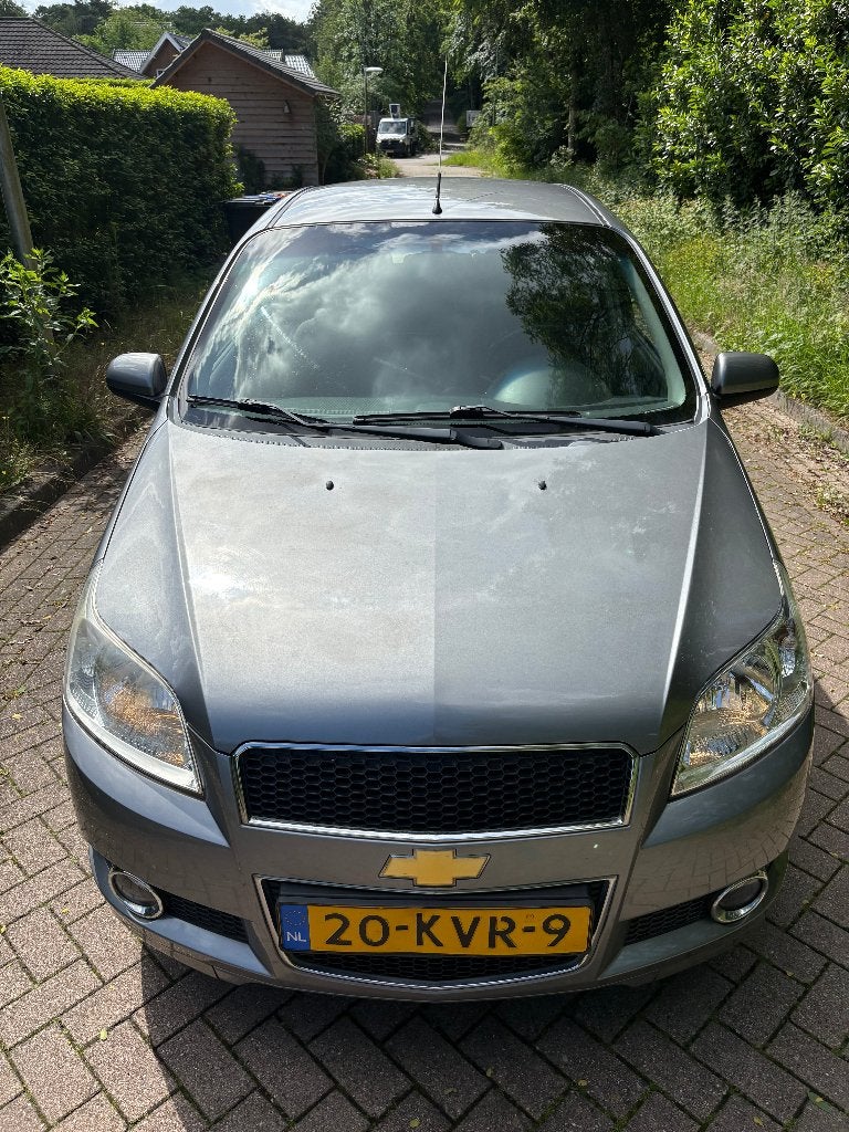 Chevrolet Aveo 1.2 16V 5D 2010 Grijs, Auto's, Chevrolet, Voorwielaandrijving, 40 €/maand, Aveo, 4 cilinders
