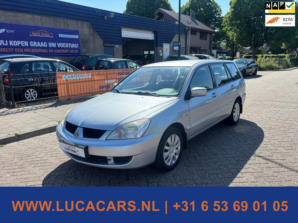 Mitsubishi Lancer Station Wagon 1.6 Inform Silver NIEUWE APK, Auto's, Voorwielaandrijving, Gebruikt, 4 cilinders, Metallic lak
