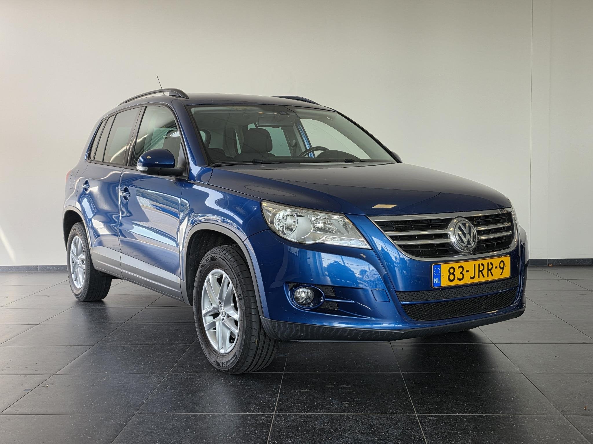 Volkswagen Tiguan 1.4 TSI Comfort&Design | Zo Meenemen | NL-, Auto's, Voorwielaandrijving, Stof, Zwart, 4 cilinders
