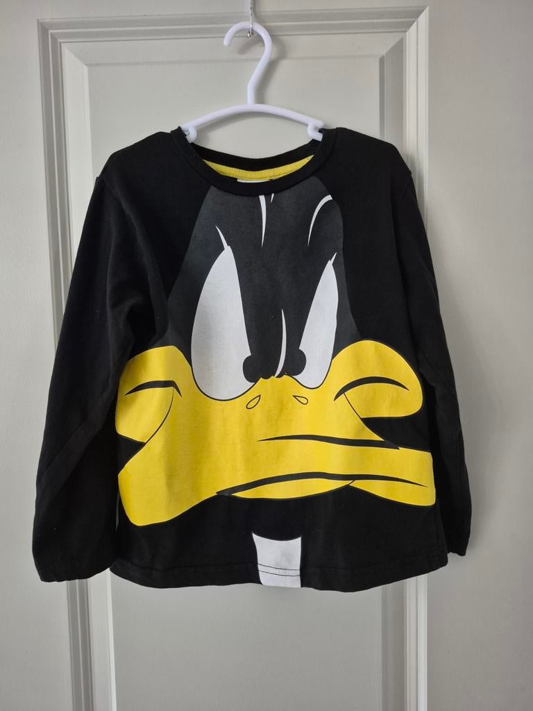 Looney tunes longsleeve shirt zwart geel daffy duck 110 116, Looney tunes, Ophalen of Verzenden, Zo goed als nieuw, Shirt of Longsleeve