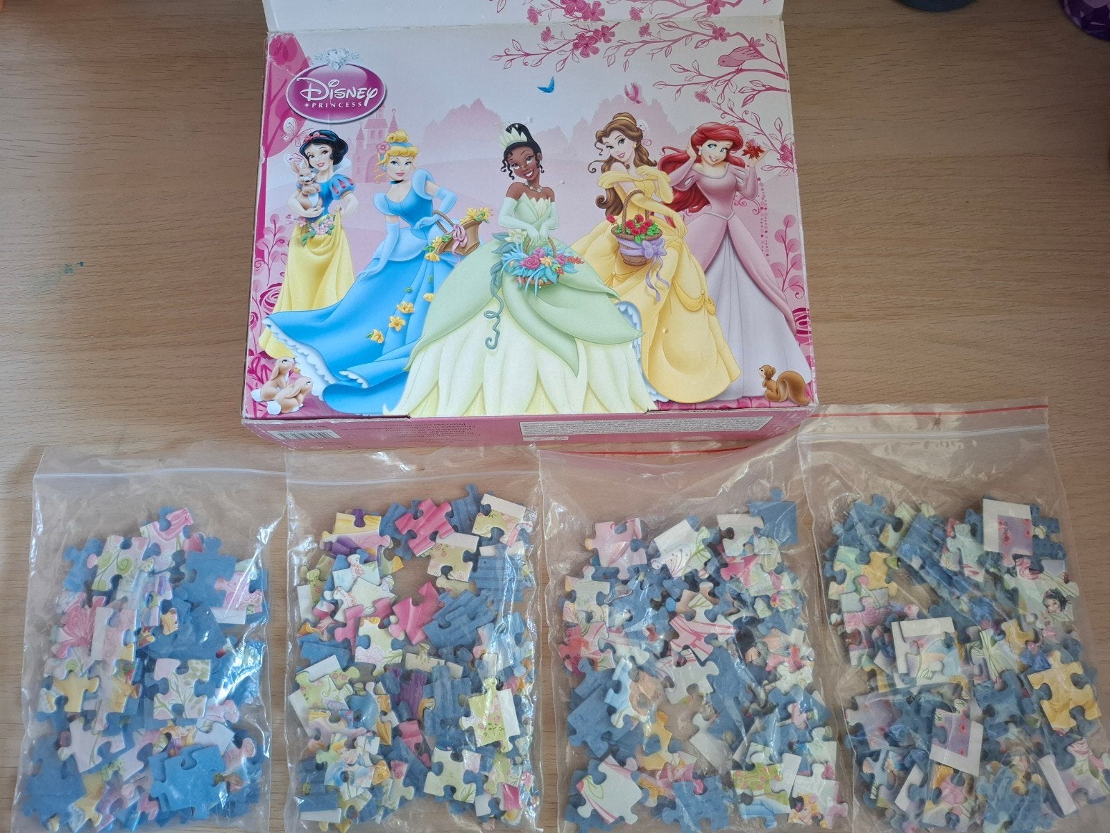 Disney puzzels 4x 80st in een doos, Ophalen, 10 tot 50 stukjes, Gebruikt, 6 jaar of ouder