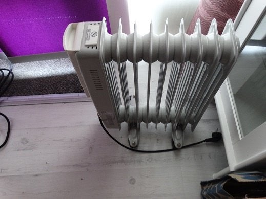 Olieradiator met drie standen. Acht elementen., Oliekachel, Elektrisch, Ophalen of Verzenden, Zo goed als nieuw