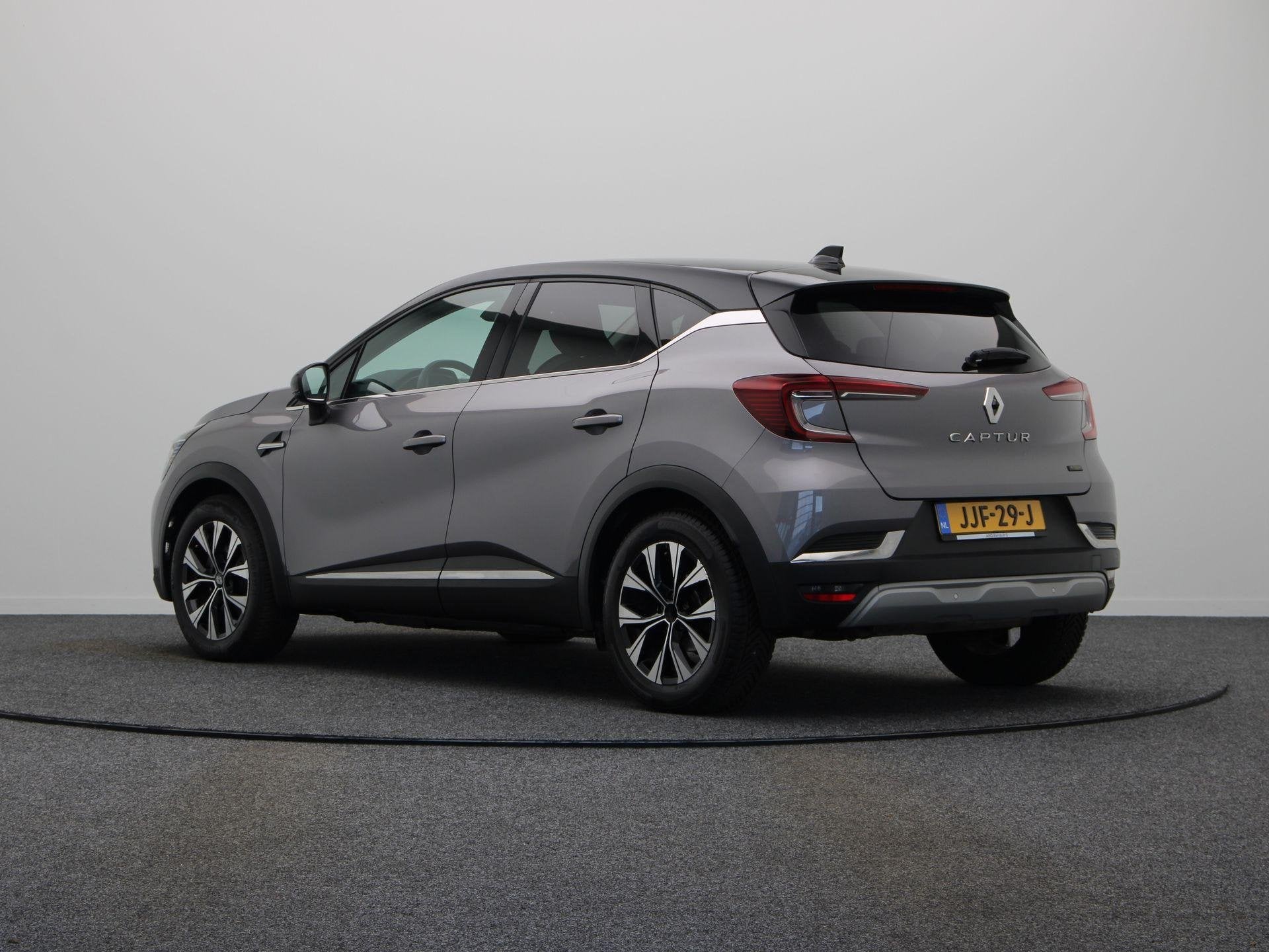 Renault Captur E-Tech Hybrid 145pk Techno | Achteruitrijcame, Auto's, Dealer onderhouden, Gebruikt, 715 kg, Leder en Stof
