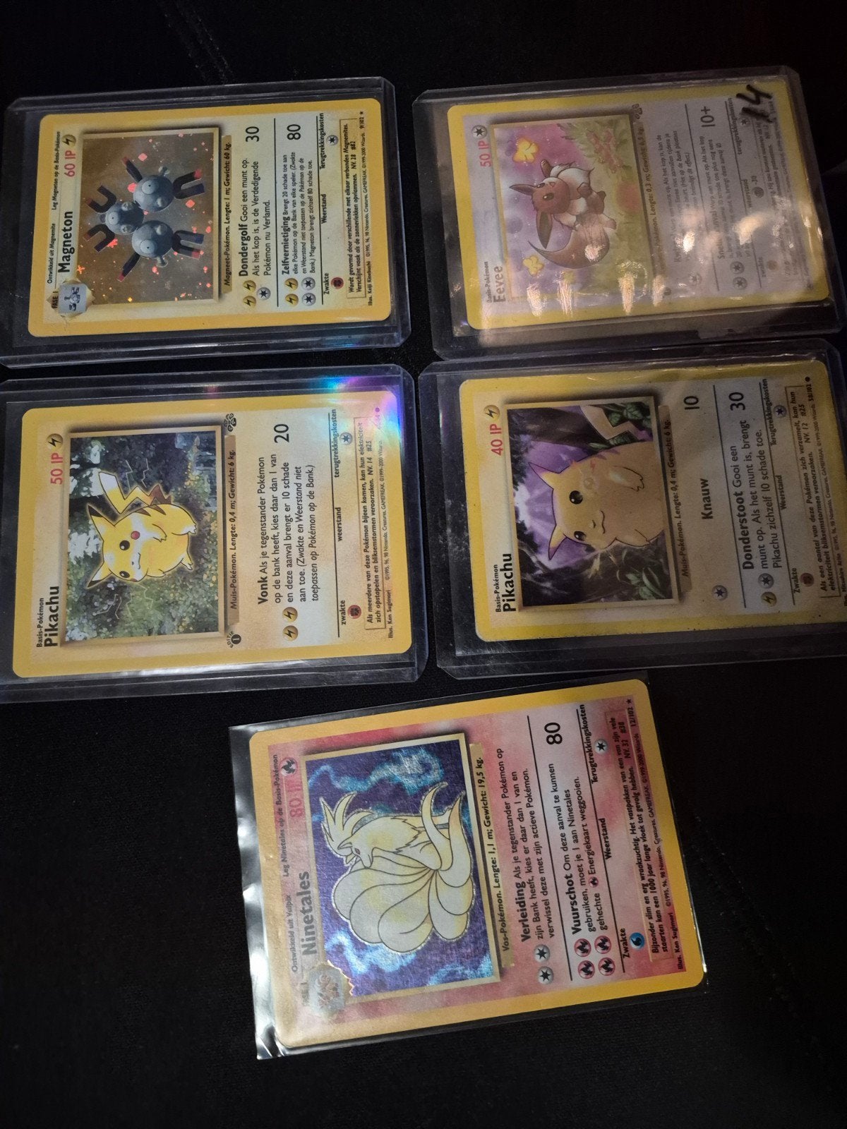 pokemon base jungle nederlands first edition, Ophalen of Verzenden, Zo goed als nieuw, Meerdere kaarten
