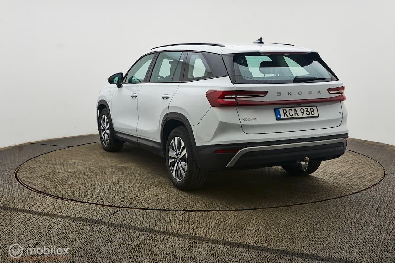Skoda Kodiaq 1.5 TSI PHEV Business Edition, trekhaak, Auto's, Stof, 4 cilinders, Wit, Plug-in hybride