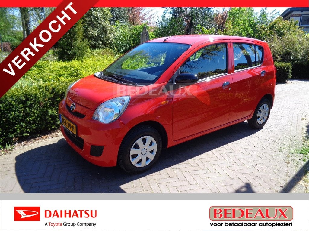 DAIHATSU Cuore 1.0 51KW 5D Comfort bij Daihatsu dealer met 1, Auto's, Automaat, 12 maanden, Stof, Zwart
