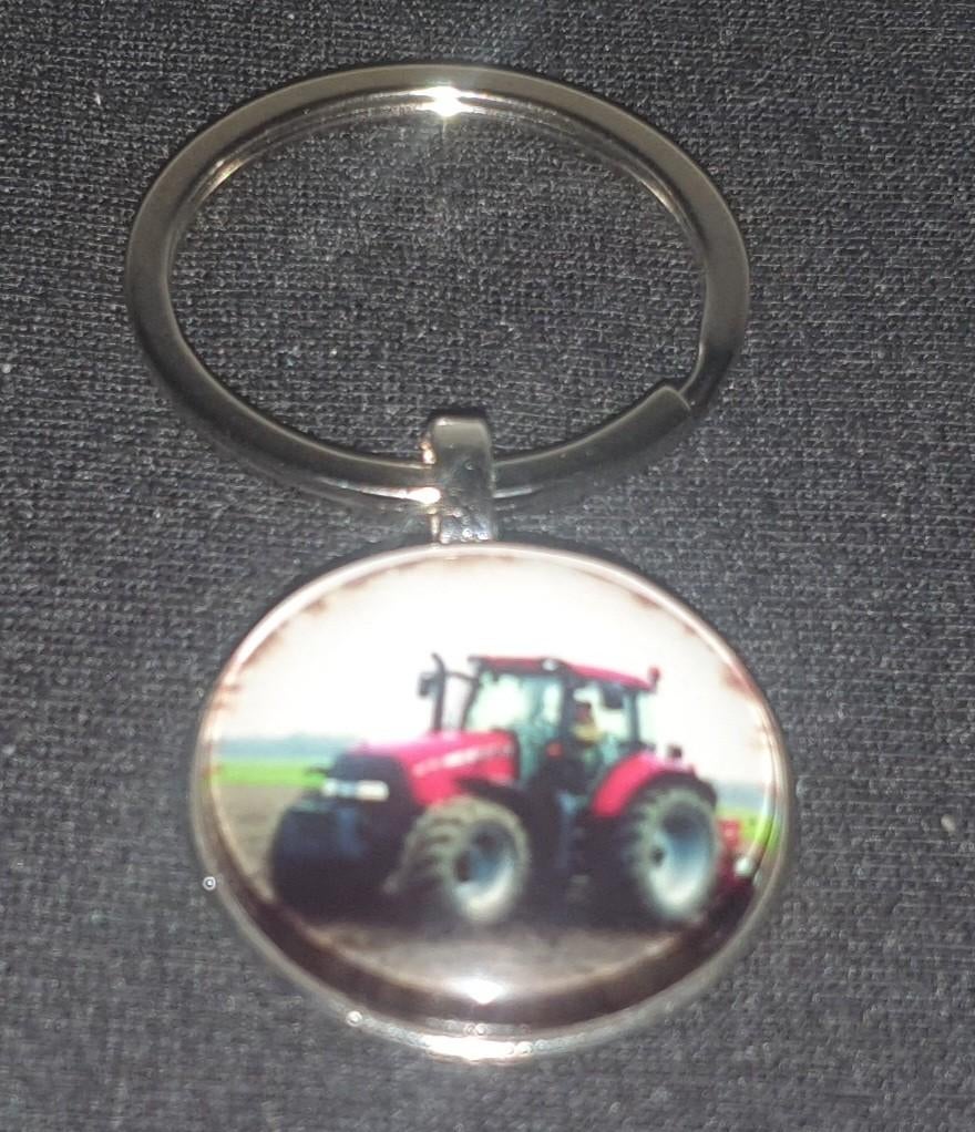 Sleutelhanger met een afbeelding van een rode tractor., Ophalen of Verzenden, Nieuw