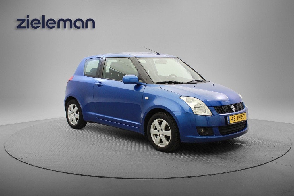 Suzuki SWIFT 1.3 Exclusive Automaat - Airco, Trekhaak, Auto's, Automaat, Huisgarantie, Met garantie (alle), Blauw