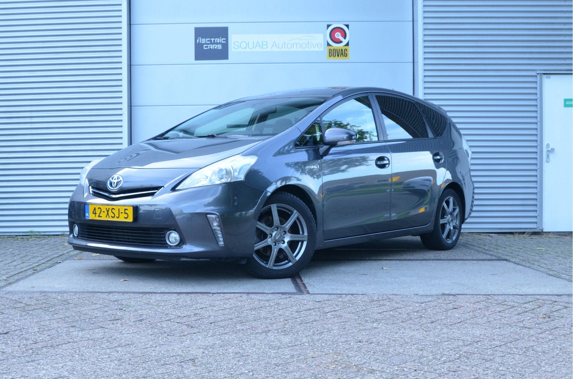 Toyota Prius Wagon 1.8 Aspiration 96g 7-zits, Fiets Trekhaak, Auto's, Gebruikt, Zwart, 4 cilinders, 7 stoelen