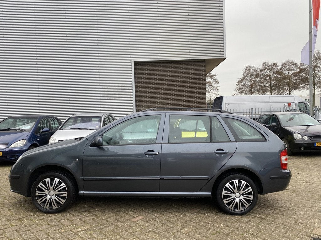 Skoda Fabia Combi 1.2-12V Ambiente,Airco,Cruisecontrol,Bleut, Auto's, Voorwielaandrijving, 750 kg, 1198 cc, 49 €/maand