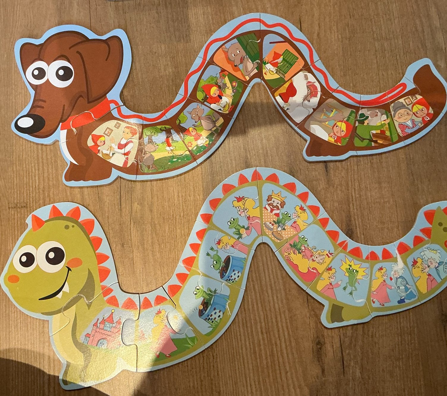 Kinderpuzzels: sprookjes Hond en Draak (2 stuks), Ophalen of Verzenden, 10 tot 50 stukjes, Gebruikt, 2 tot 4 jaar