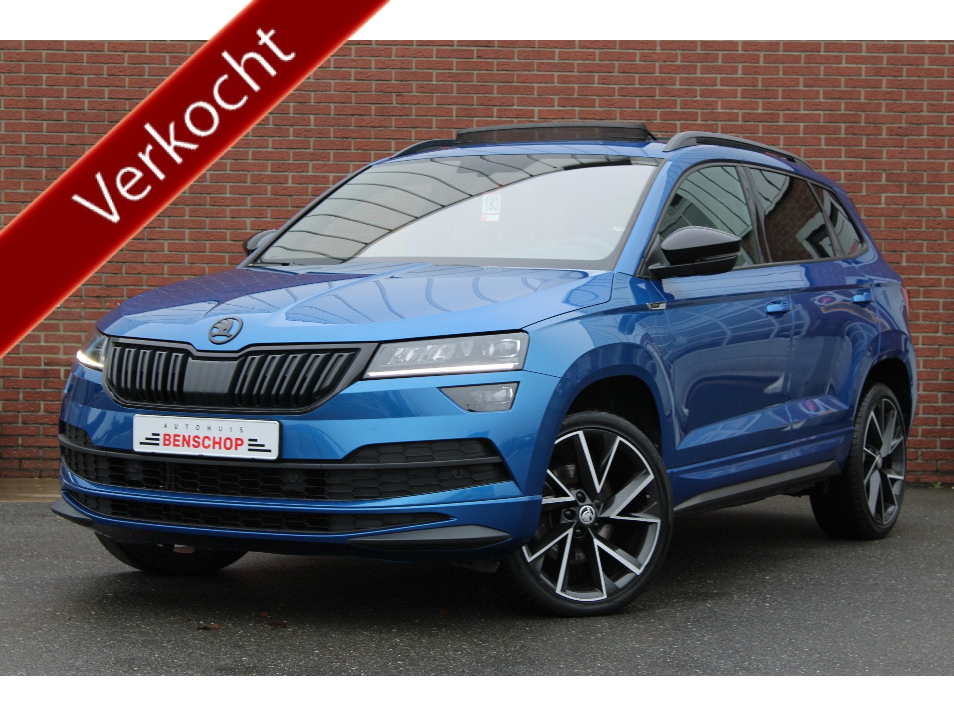 Skoda Karoq 1.5 TSI 150PK ACT Sportline Business |PANO-DAK|T, Auto's, Dealer onderhouden, 4 cilinders, Blauw, Karoq