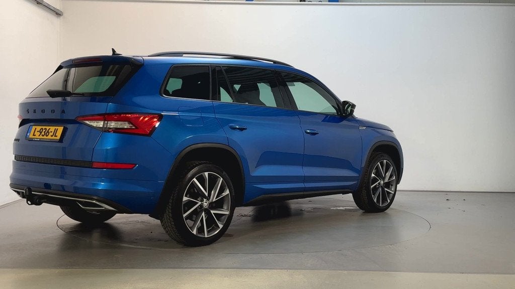 Skoda Kodiaq 1.5 TSI 150pk DSG Sportline Business Panoramada, Auto's, Skoda, 4 cilinders, Blauw, Origineel Nederlands, Bedrijf