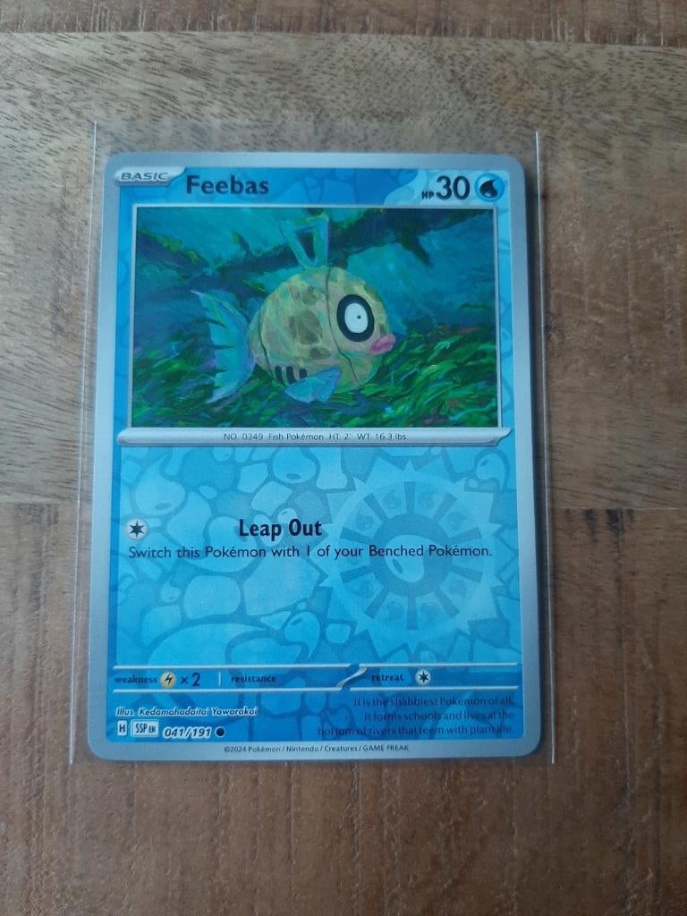 Feebas #41, Reverse Holo, Pokemon Surging Sparks, Ophalen of Verzenden, Nieuw, Losse kaart