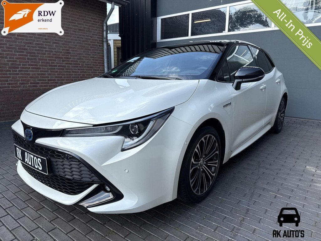 Toyota Corolla 2.0 Hybrid Dynamic / Navi / Camera / Bi-Tone, Auto's, Stof, Gebruikt, 4 cilinders, Corolla