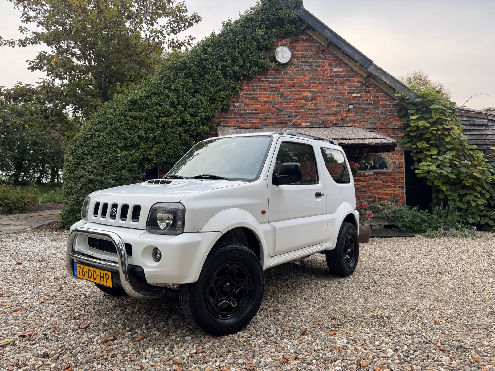 Suzuki Jimny 1.3 JX 4WD Wit, Metal top, zeer compleet*UNIEK*, Stof, 40 €/maand, 4 cilinders, 4 stoelen