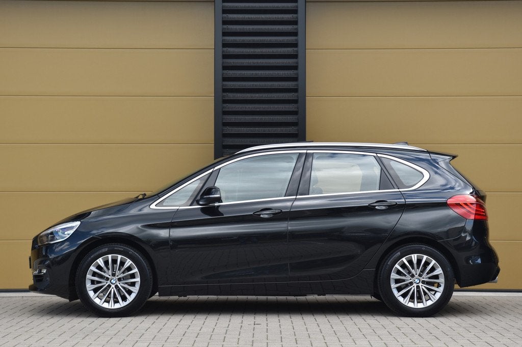 BMW 2 Serie Active Tourer 218i High Executive * Luxury line, Gebruikt, Met garantie (alle), Zwart, Bedrijf