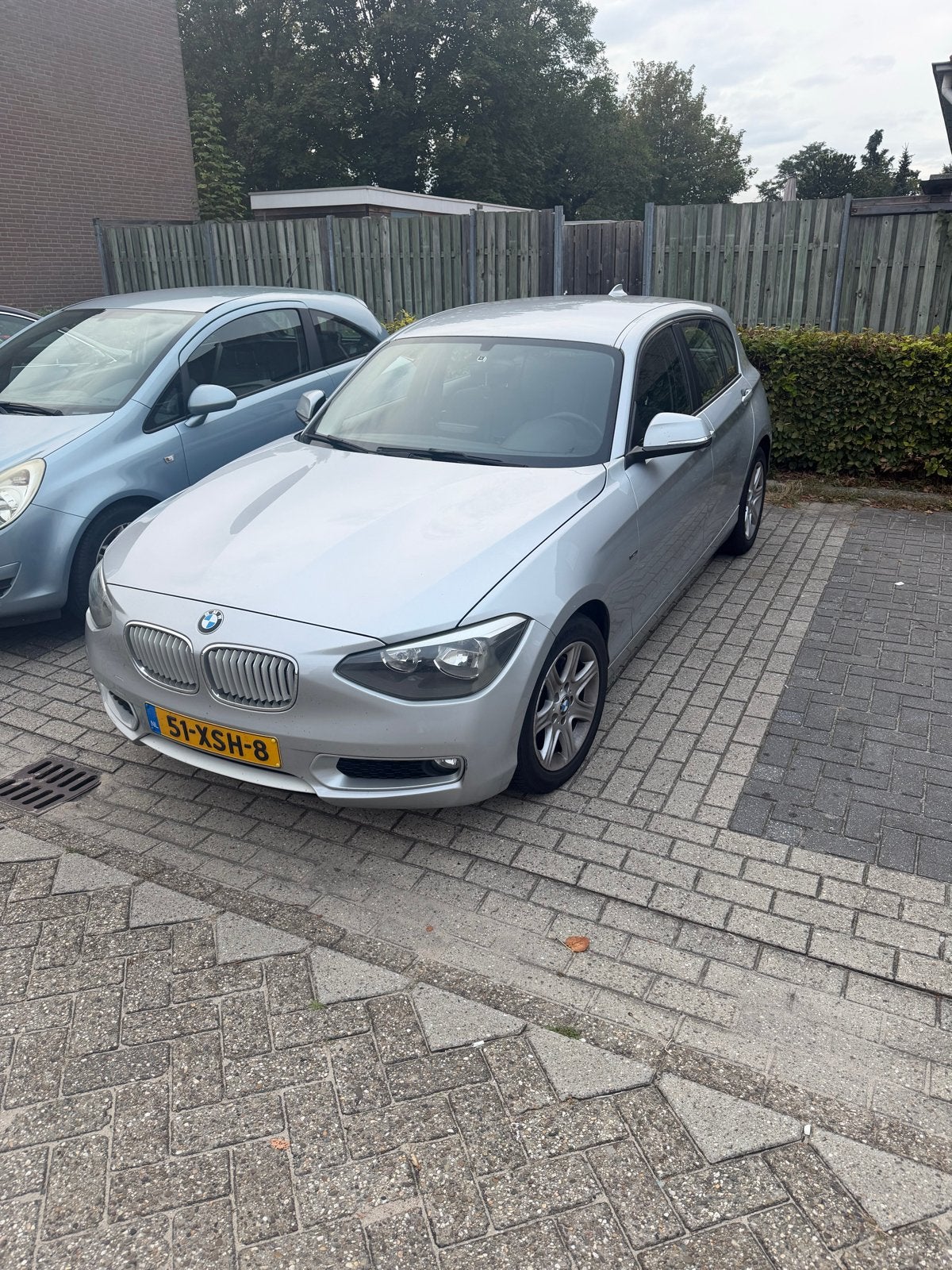 BMW 1-Serie 116I 100KW 5DR 2012 Grijs, Auto's, 1-Serie, 4 cilinders, Origineel Nederlands, 1200 kg
