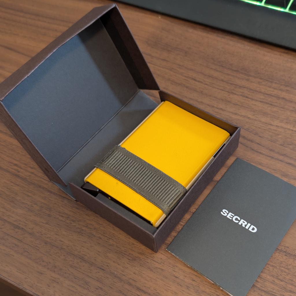 Secrid - Cardslide original - mini wallet, Ophalen of Verzenden, Gebruikt, Geel, Overige merken
