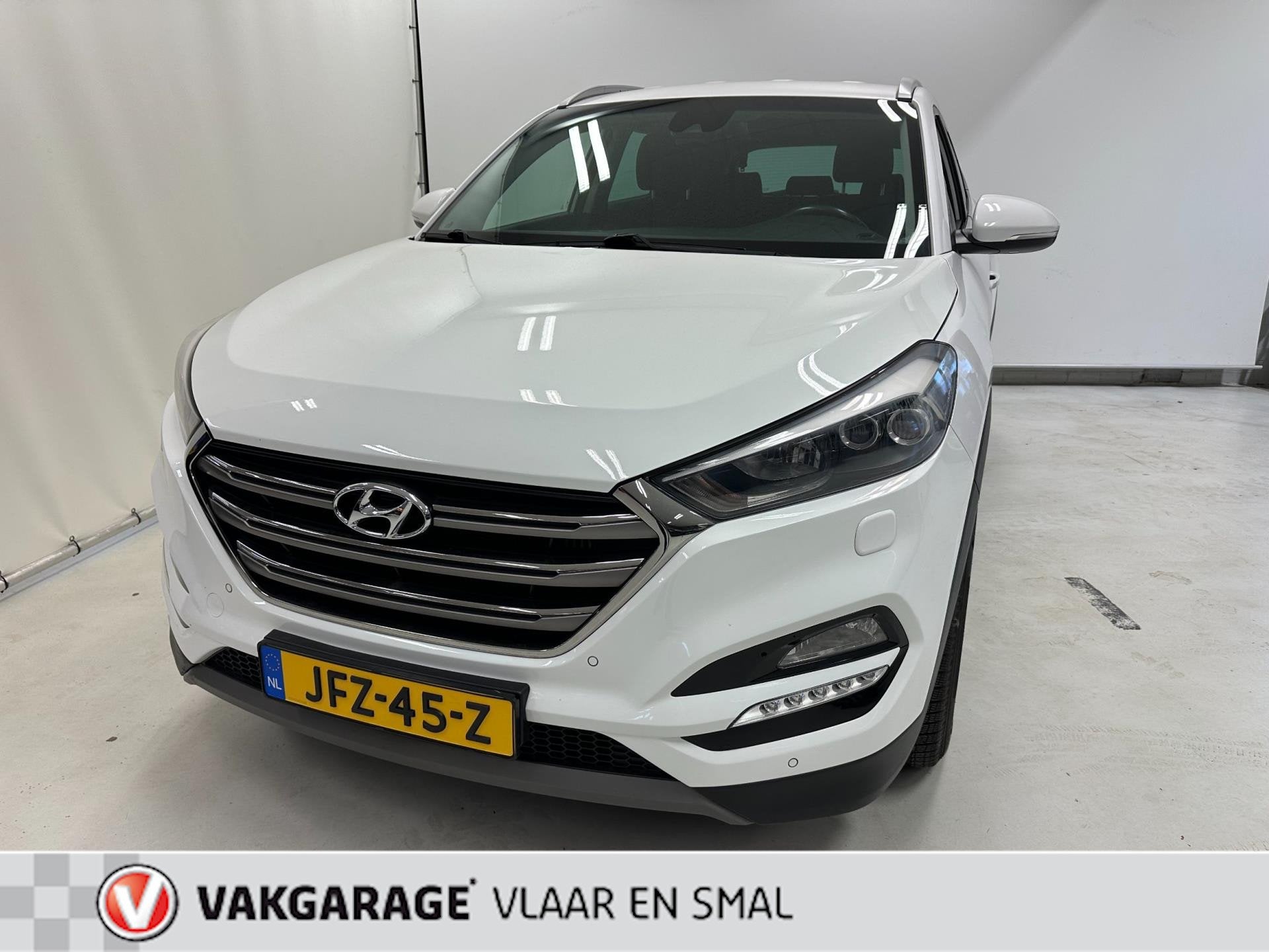 Hyundai TUCSON 1.6 T-GDi Comfort 4WD -Navigatie-Camera-stoel, Auto's, Stof, Gebruikt, 4 cilinders, Wit