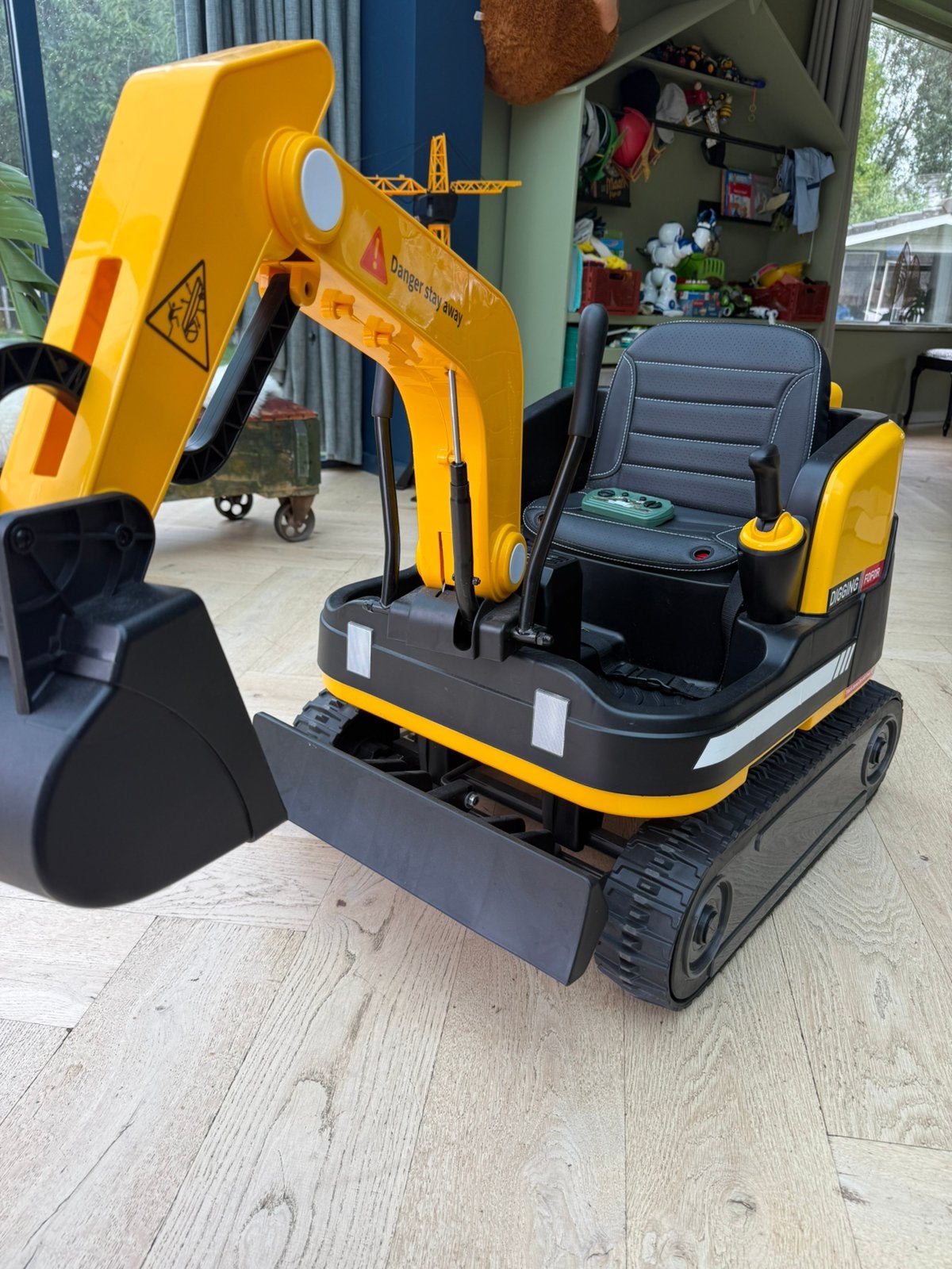 Kinder graaf machine op rups., Zo goed als nieuw