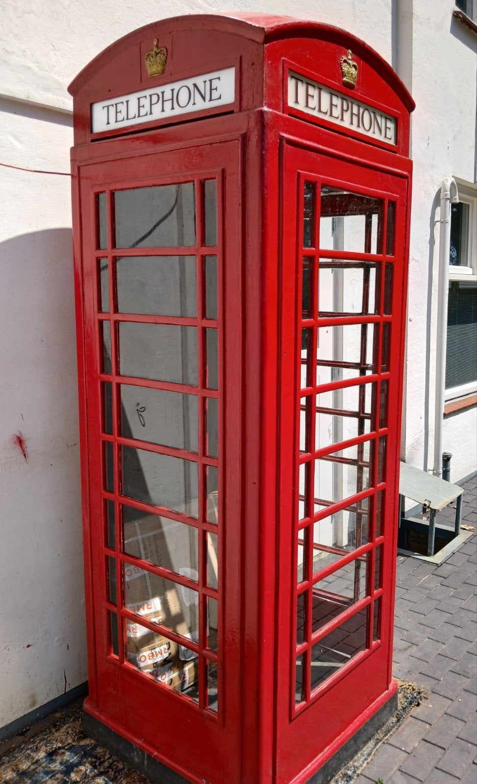 Originele Engelse telefooncel, Ophalen