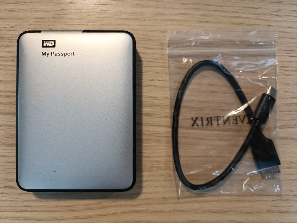 WD My Passport Externe HDD 1TB, Computers en Software, Verzenden, HDD, 5601 Great America Parkway, San Jose, CA 95134, USA, Zo goed als nieuw
