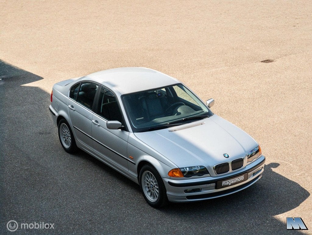 BMW E46 320i | Org NL | Leer Sportstoelen | Airco | Cruise, Auto's, BMW, Achterwielaandrijving, Gebruikt, Zwart, 150 pk
