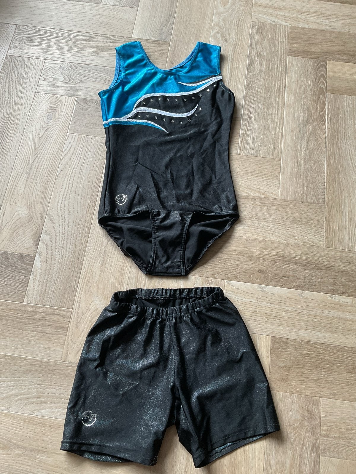 Turnpakje en bijpassend broekje - Zwart/Blauw, Ophalen of Verzenden, Gebruikt