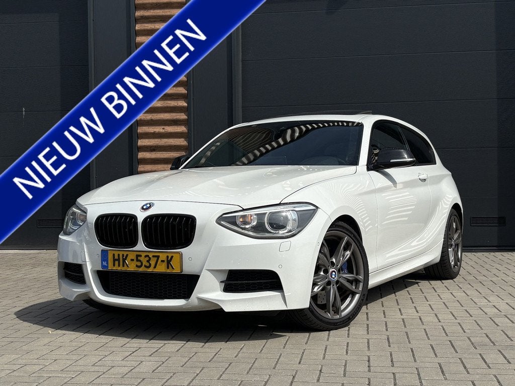 BMW 1-serie M135i M-Sport High Executive Airco Cr-Control Ca, Auto's, Euro 5, Achterwielaandrijving, Gebruikt, Zwart