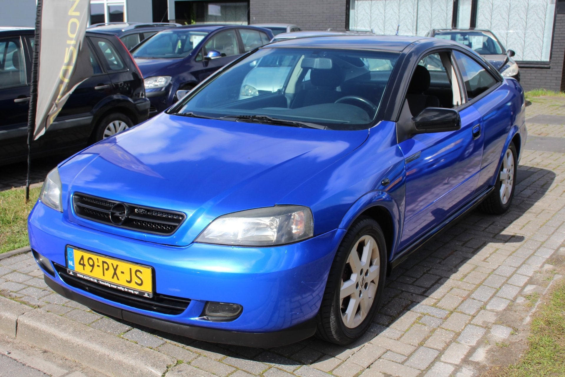 Opel Astra Coupé 1.8-16V Bertone Coupé Wrapped Airco LM-Ve, Gebruikt, Zwart, 1796 cc, Origineel Nederlands
