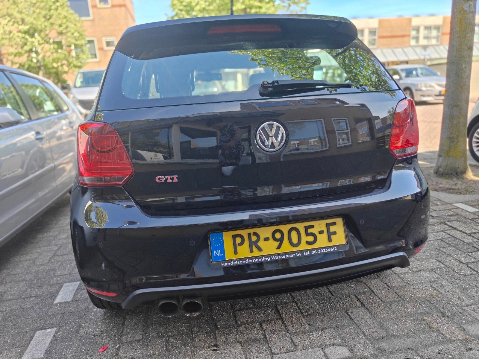 Volkswagen Polo 1.4 TSI 132KW DSG 2011 Zwart, 1169 kg, Zwart, 4 cilinders, Navigatiesysteem