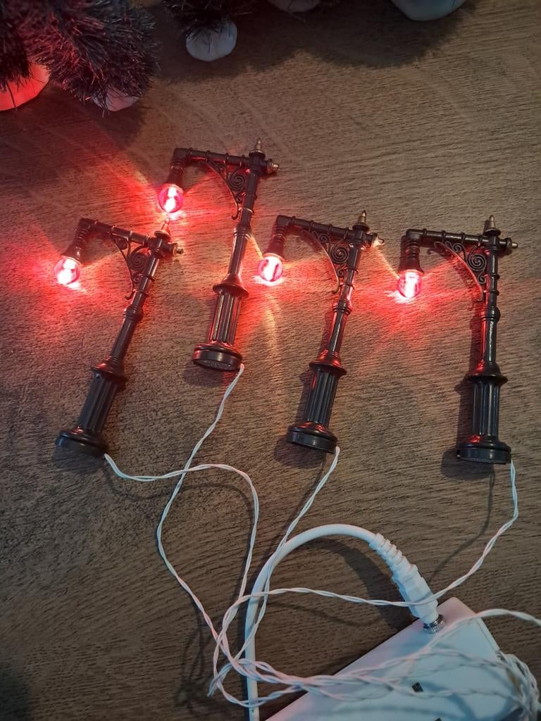 4 straatlantaarns voor kerstdorp, Ophalen