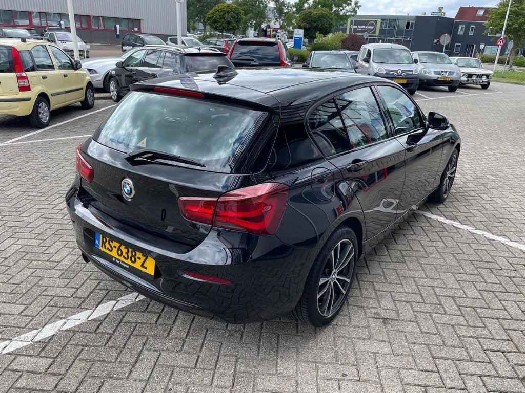 BMW 1-serie 116i Edition Sport Line Shadow Executive, Auto's, BMW, Zwart, Origineel Nederlands, 19 km/l, 3 cilinders