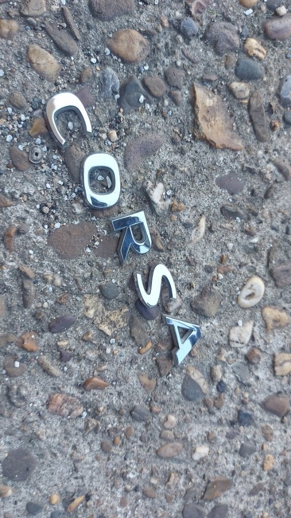 Emblemen op de achterklep Opel Corsa D, Ophalen of Verzenden