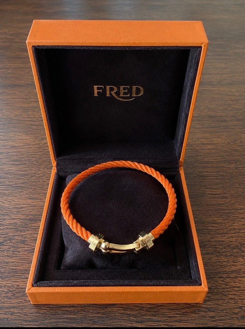 Fred Armband Oranje met goud, Ophalen of Verzenden, Zo goed als nieuw, Oranje, Goud