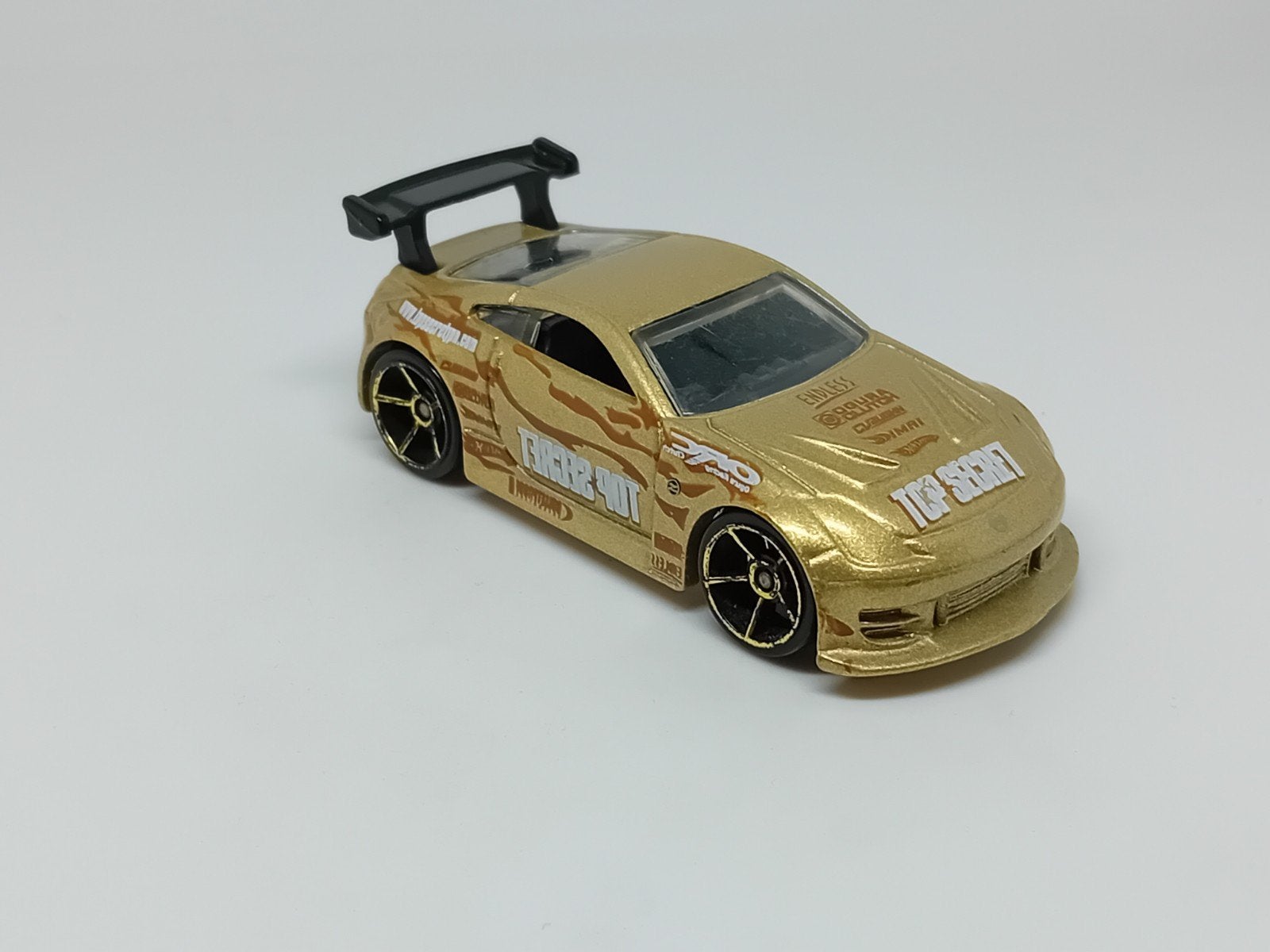 Hot Wheels Nissan 350 Z Gold Top Secret, Ophalen of Verzenden, Zo goed als nieuw, Auto