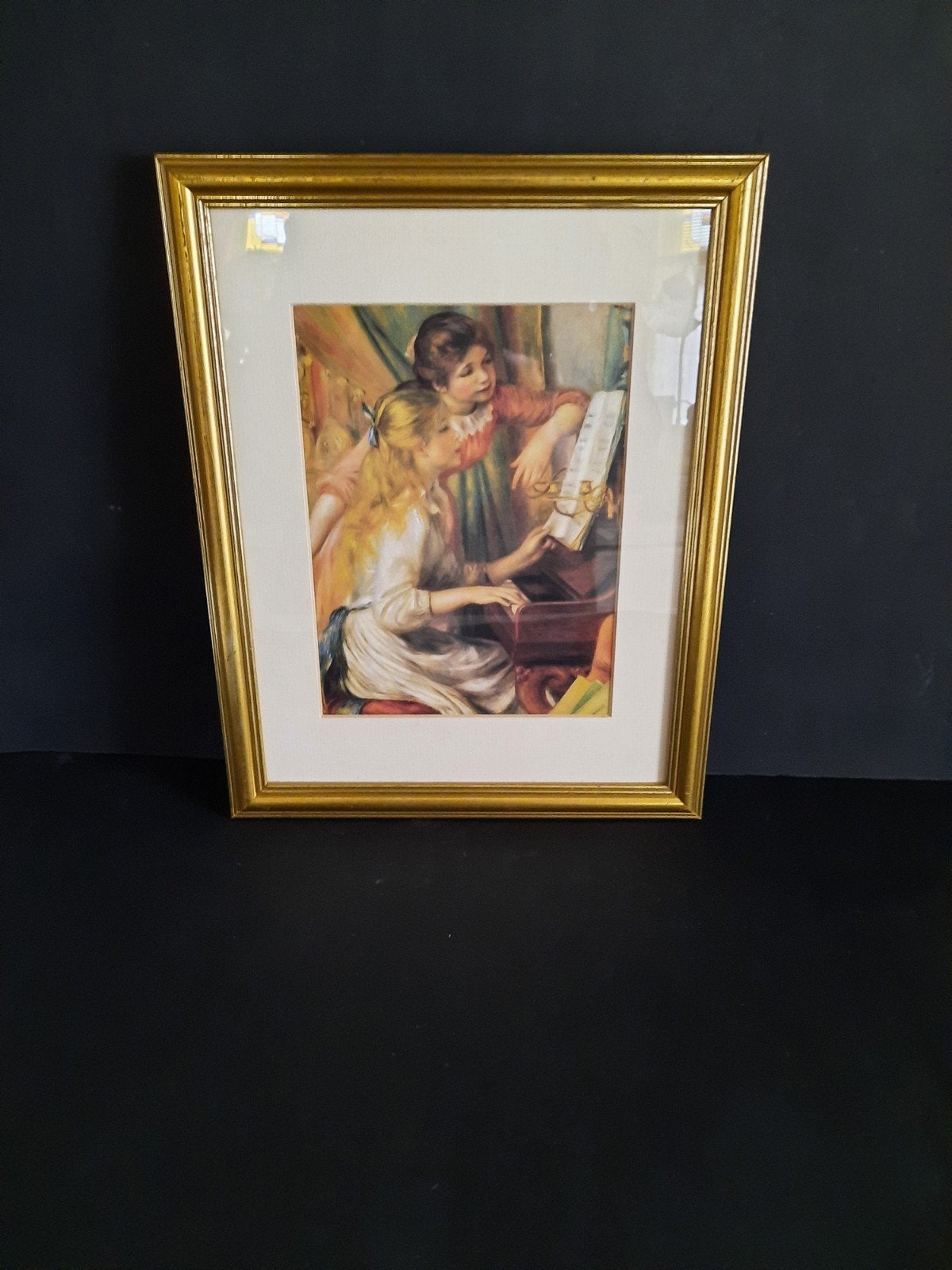 Ingelijste reproductie van Renoir's 'Meisjes aan de piano', Ophalen of Verzenden