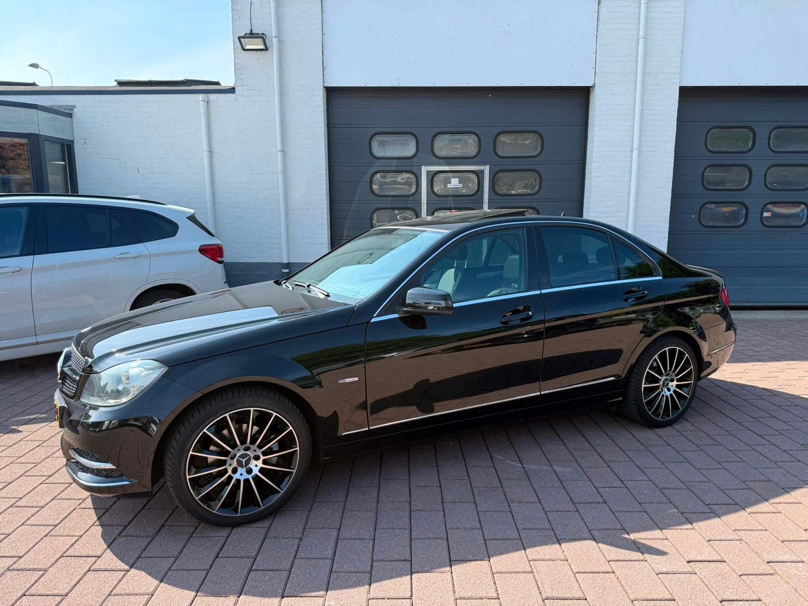 Mercedes-Benz C-Klasse C180 Avantgarde Aut7 2012 panodak, Auto's, Mercedes-Benz, Automaat, Zwart, 75 €/maand, Particulier
