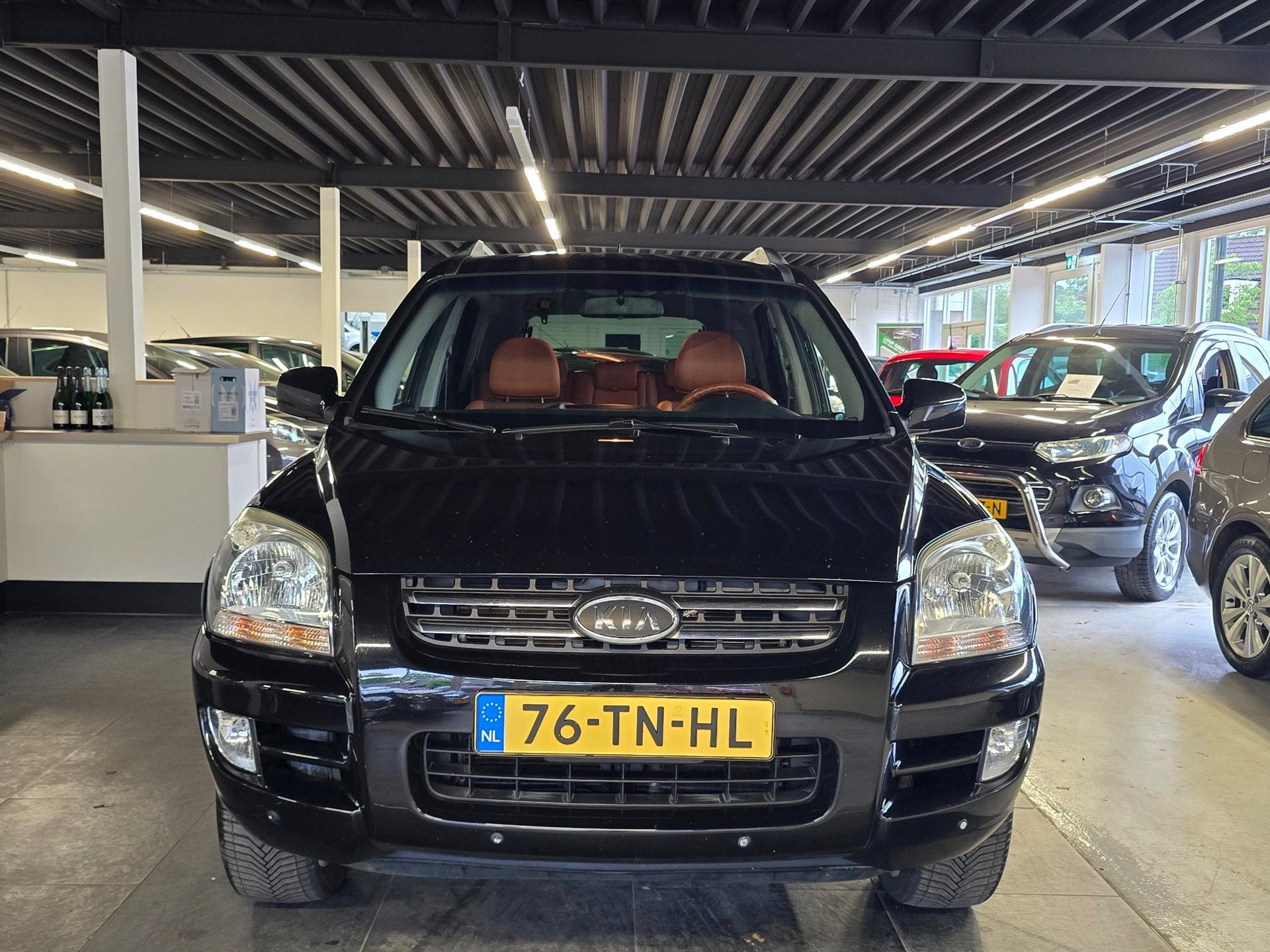 Kia Sportage 2.7 V6 M-bition 4WD/AUTOMAAT/CARPLAY/N.A.P/, Auto's, Automaat, Verwarmde buitenspiegels, Gebruikt, Zwart