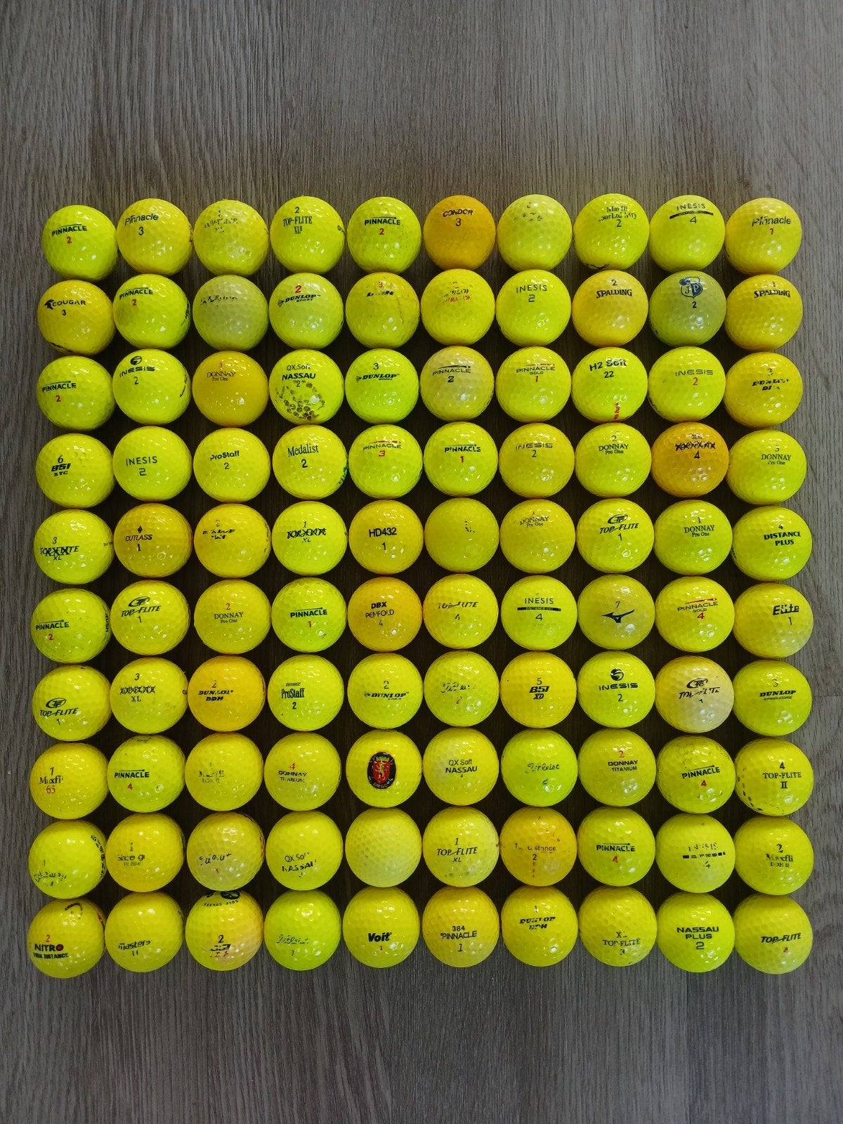 100 gele gekleurde golfballen, Ophalen of Verzenden, Zo goed als nieuw, Bal(len)