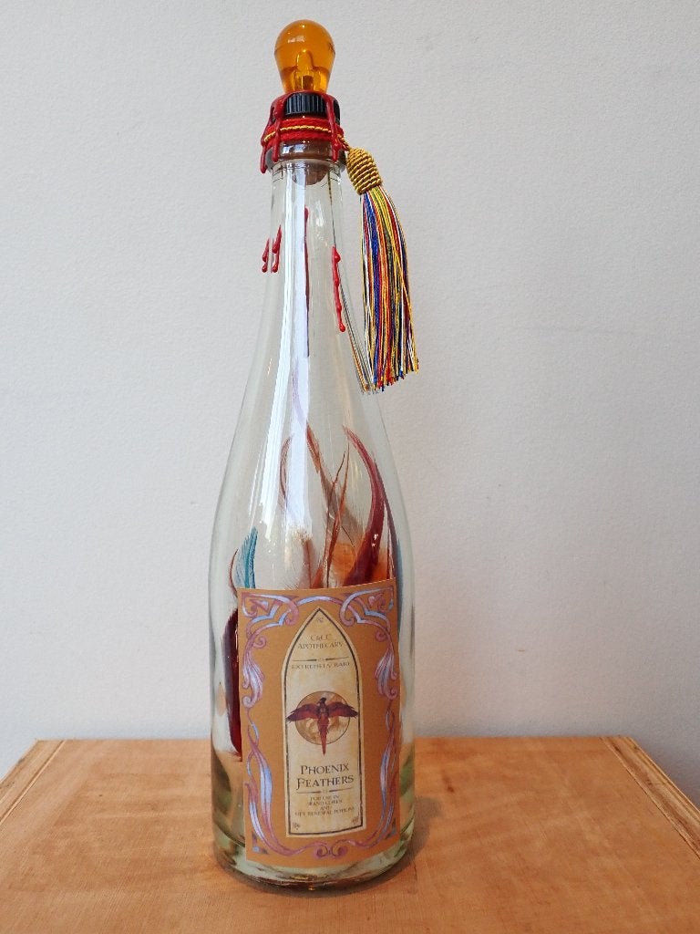 Harry Potter Phoenix Feathers Potion, Ophalen of Verzenden, Zo goed als nieuw, Versiering, Overige