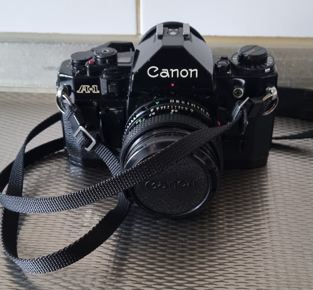 Canon A-1 fototoestel met lens., Audio, Tv en Foto, Fotocamera's Analoog, Ophalen of Verzenden, Gebruikt, Spiegelreflex, Canon