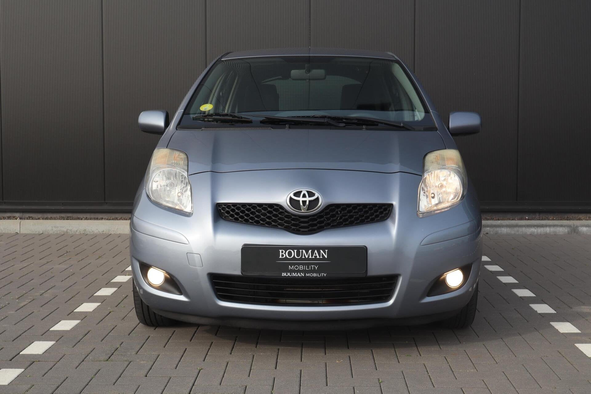 Toyota Yaris 1.3 VVTi Aspiration AUTOMAAT, CLIMATE DEALER OH, 4 cilinders, Blauw, 19 km/l, 550 kg