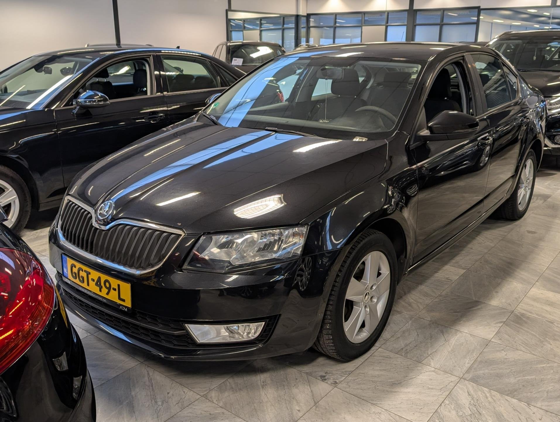 Skoda Octavia 1.6 TDI Ambition Businessline, Auto's, Voorwielaandrijving, Stof, Gebruikt, Zwart
